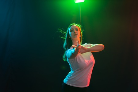 People and dancing concept - Close up portrait of jazz funk dancer woman in studio