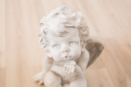 figurine and interior concept - white ceramic angelの写真素材