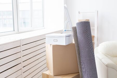Cardboard boxes and carpet - moving to a new house