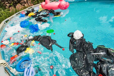 Plastic recycling, pollution and environmental concept - Environmental problem of plastic rubbish...