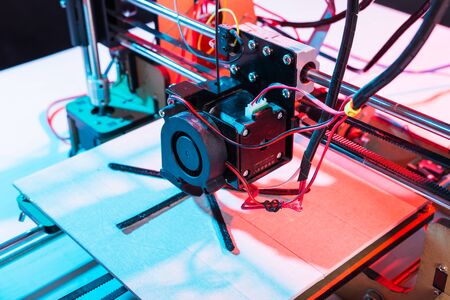 3d printer working and printing plastic prototype.の写真素材