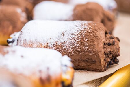 Street food festival and dessert concept - mini chocolate roll cake