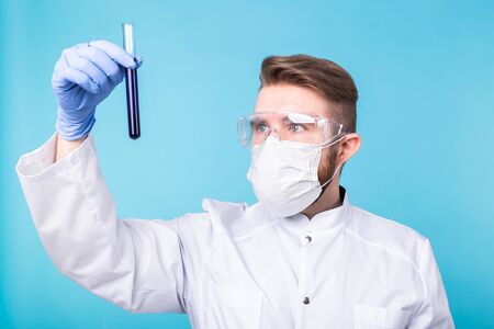 Covid-19, coronavirus, Vaccine development, pandemic and outbreak concept - Man scientist in flu...