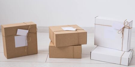 Many boxes with space for advertisement delivered from online store. Internet shopping and delivery.