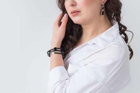 Close-up of woman wearing a Jewelry, bijouterie and accessories.の写真素材