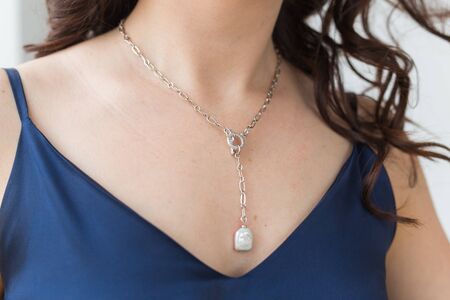 Close-up of woman wearing a Jewelry, bijouterie and accessories.の写真素材