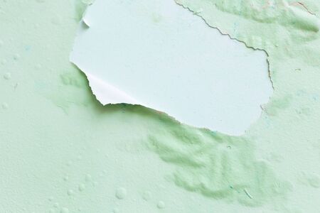 close-up of peeling painted wall