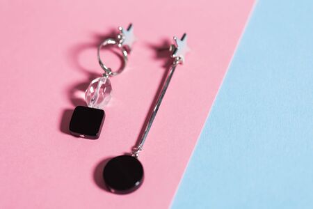 Top view of fashion jewelry and accessories on bright color background. Luxurious jewelry bijouterie and trendy.の写真素材