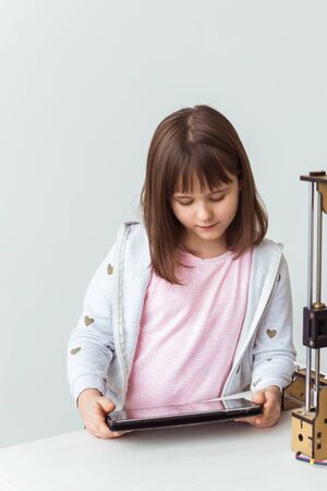 Child with digital tablet. School, technologies and children concept.の写真素材