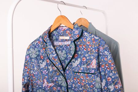Clothing retails concept. Ladies pajamas on hangers in clothes store. Pajama in shop. Advertise,...