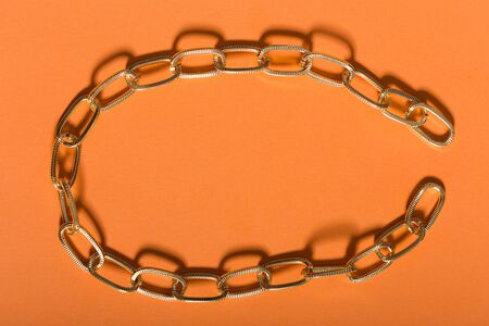 Top view of fashion jewelry and accessories on bright color background. Luxurious jewelry bijouterie and trendy.の写真素材