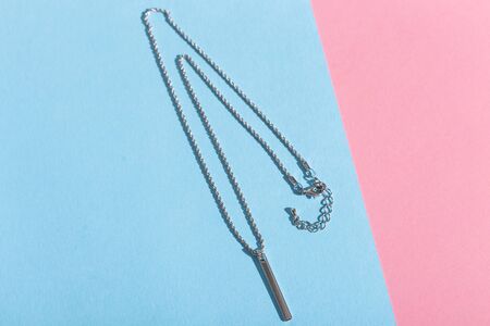 Top view of fashion jewelry and accessories on bright color background. Luxurious jewelry bijouterie and trendy concept.の写真素材