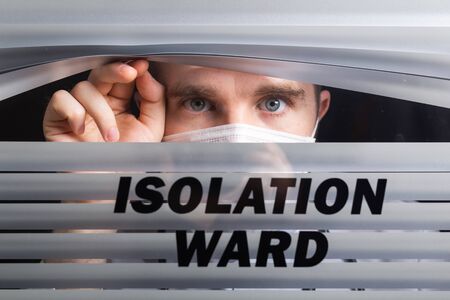 Hospital quarantine or isolation of patient standing alone in room with hopeful for treatment of...