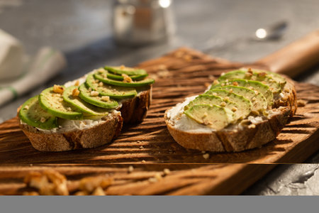 sliced avocado on toast bread with nuts