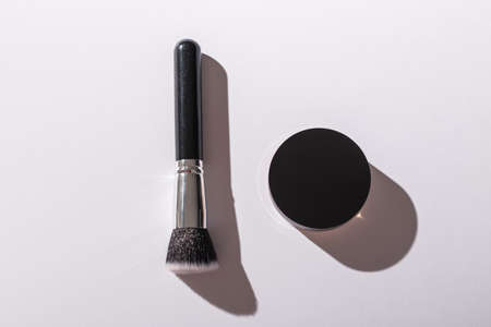 Mineral face powder and brush. Eco-friendly and organic beauty products