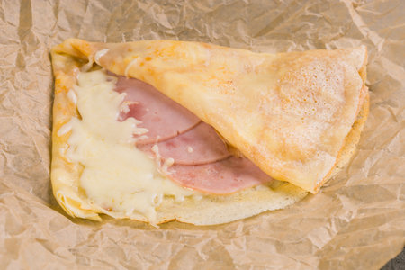 French crepe pancakes stuffed ham and cheeseの写真素材