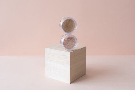 Makeup mineral eco face powder products on pastel background. Eco friendly cosmetics.