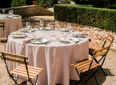 Luxury elegant wedding reception table arrangement and floral centerpiece - wedding banquet and event outdoorの写真素材