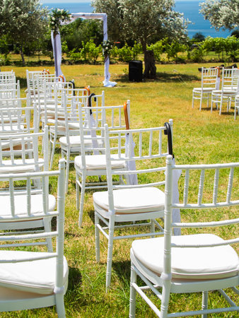 Chairs for wedding ceremony outdoors - wedding decorationsの写真素材