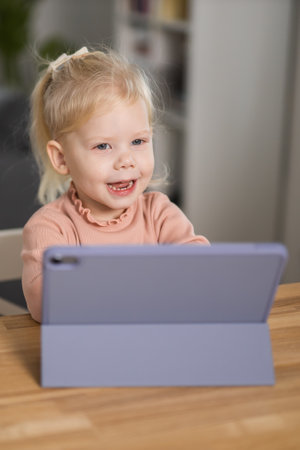 Funny baby with cochlear implant. Hear aid and medicine innovating technology and diversity conceptの写真素材