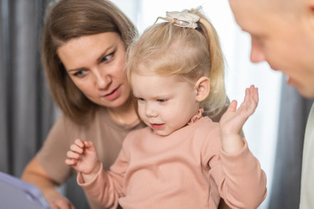 Cochlear implant on the girl head - hearing aid. Modern medicine technologies for deafness treatmentの写真素材