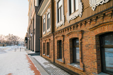 Building and houses in winter season. Snow in city and town street architectureの写真素材