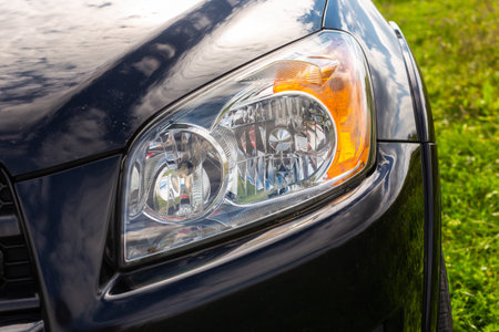 Headlight of black car. Led car headlight.の写真素材
