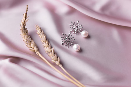 Handmade jewelry on a textile background. Gift for women. Bijouterie and jewellery for women.の写真素材