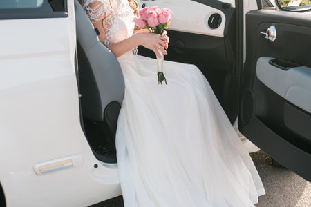 Bride holds a wedding bouquet, wedding dress, wedding details.の写真素材