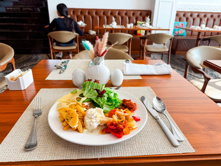 Lunch plate with vegetables, meat and potatoes on a dining table. Nutrition, gourmet food and balanced healthy eating in restaurant setting.の写真素材