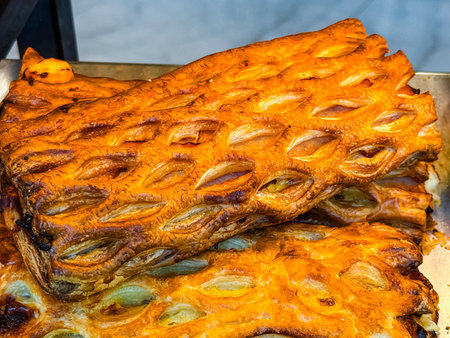 Baked puff pastry with lattice top and sweet filling. Dessert, indulgence and traditional bakery style.の写真素材