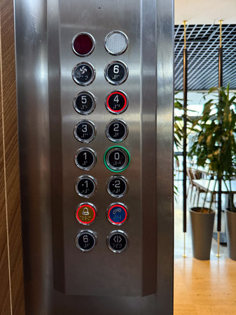 Elevator panel with numbered floor buttons. Technology, navigation, and public service reflecting accessibility, urban architecture, and modern functional design.の写真素材