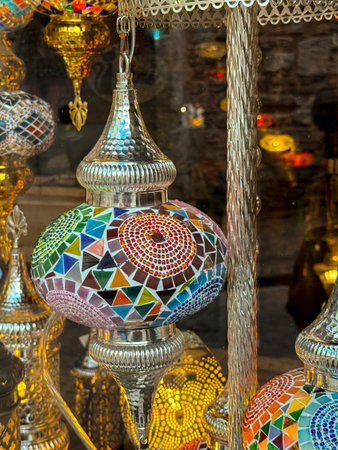 Colorful mosaic lamp with silver details. Tradition, craftsmanship, and oriental design in interior...