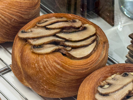 Mushroom Danish pastry with golden crust. Earthy aroma, texture harmony, and refined minimalism in...