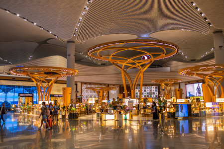 ISTANBUL, TURKEY - August 09, 2022: A view of duty free shops and stores at the international departure terminal of New International Istanbul Airport.のeditorial素材