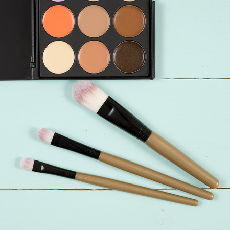 Make up set soft makeup brushes and maskara on whight backgroundの写真素材