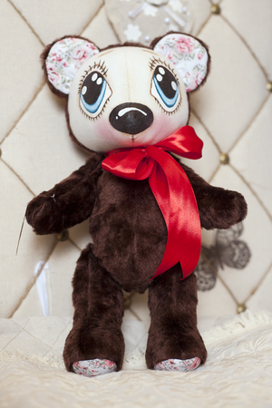 Handmade doll in the interior.の写真素材