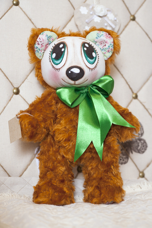 Handmade doll in the interior.の写真素材