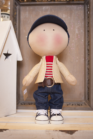 Handmade doll in the interior.の写真素材