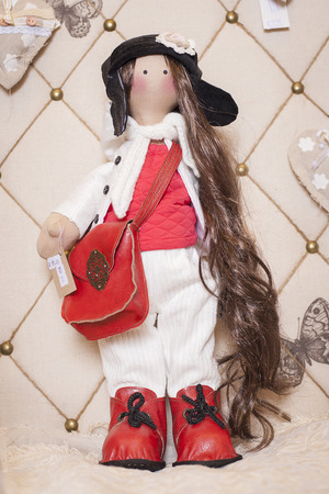 Handmade doll in the interior.の写真素材