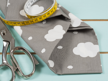 Colorful cotton fabric, meter and scissor