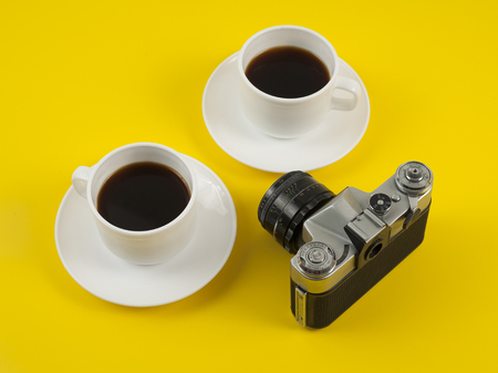 Top view image of coffe cup on yellow background flat lay copy space