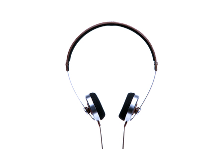 Silver headphones with cable isolated on white background.の写真素材