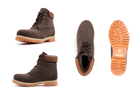 Men's brown shoes, boots isolated white background. Side view, top view and soleの写真素材