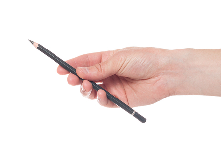 Hand holding black pen isolated on white background.の写真素材