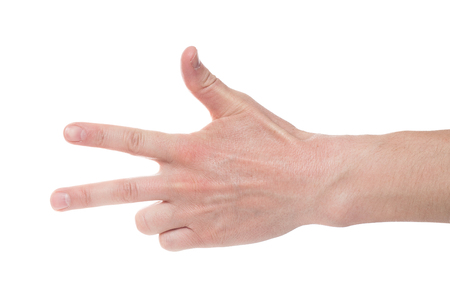 Man showing number three on white background, closeup.の写真素材