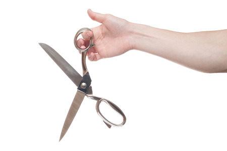 Hand holding big steel scissors, industrial tool