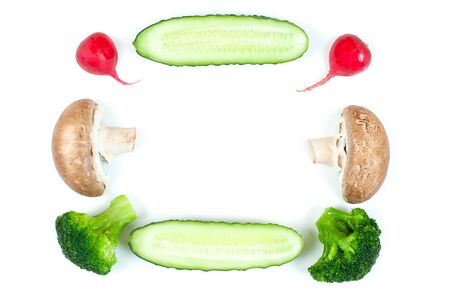 Ingredients for homemade pizza on white background. Top view. Ingredients for salad: radish, slices mushrooms, slices tomatoes, cucumbers, broccoli and salad . Healthy food conceptionの写真素材