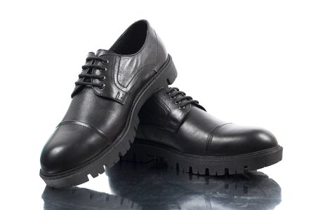 Pair of male shoes isolated on the whiteの写真素材