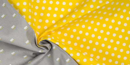 A group of twisted colored gauze fabric textile palette holiday interior top view horizontalの写真素材